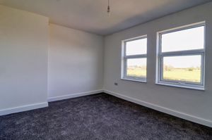 Bedroom One- click for photo gallery